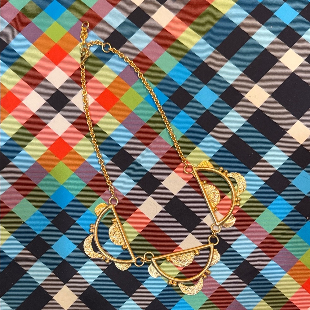 Elegant Gold Women's Necklace purchased at The Schomburg Museum.